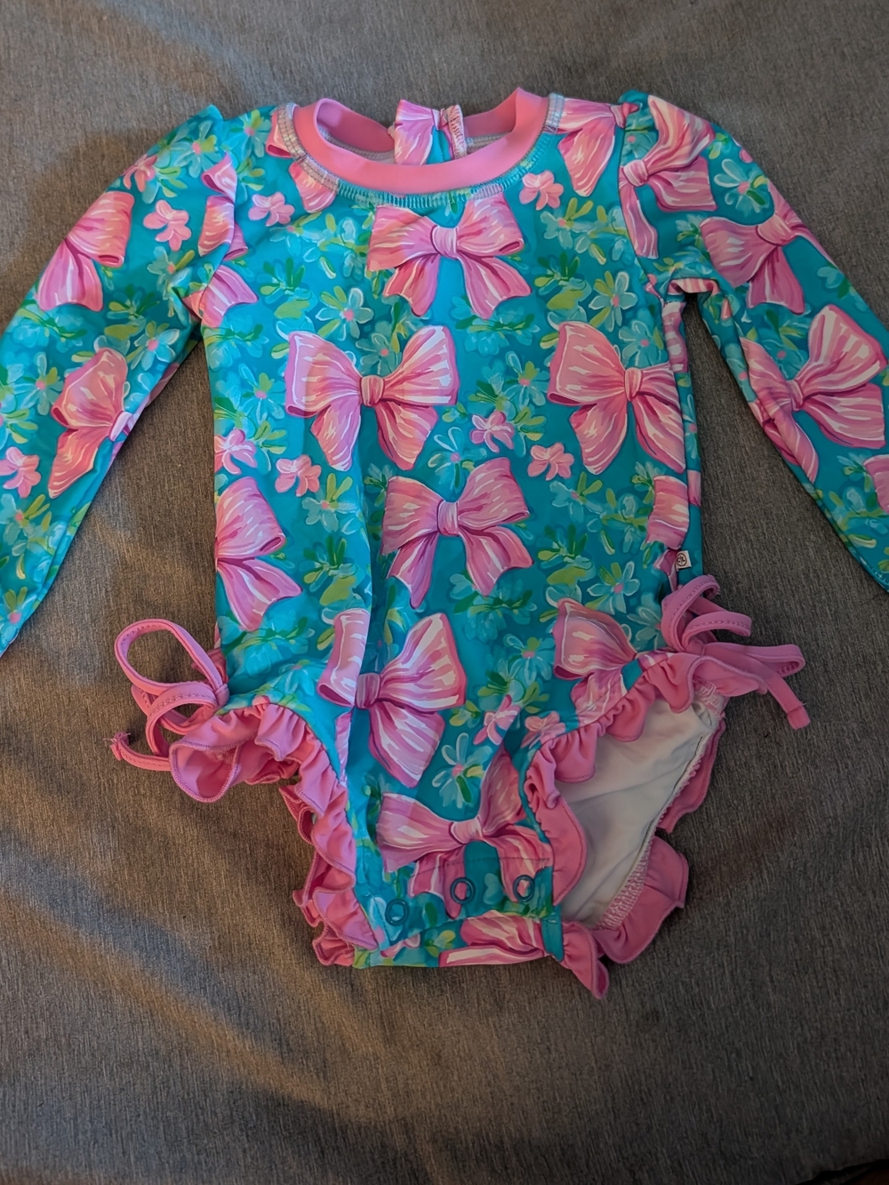 Caden Lane Turquoise Long-Sleeve Rashguard One-Piece with Pink Bows